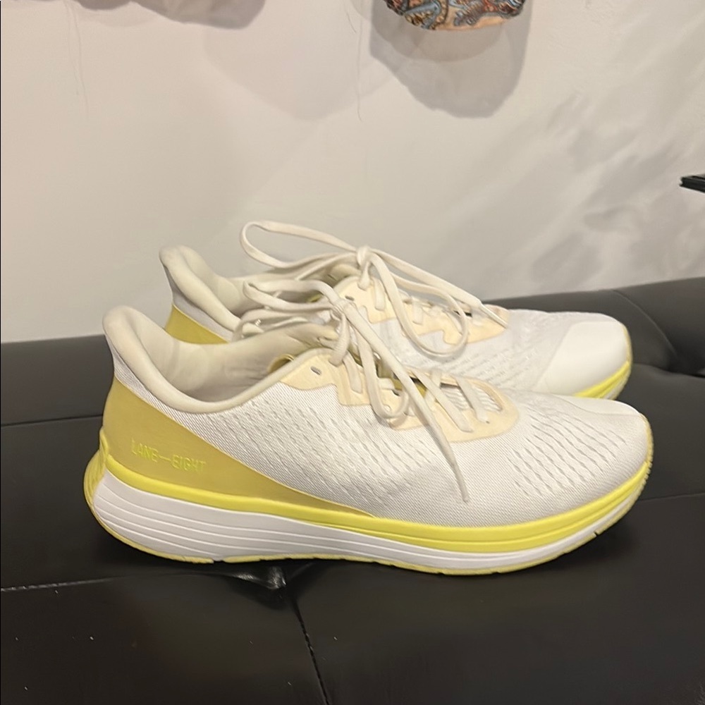 White and Yellow Athletic Shoes with Breathable Mesh lane eight